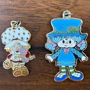 1980s AGC Strawberry Shortcake & Blueberry Muffin Enamel Necklace Bundle